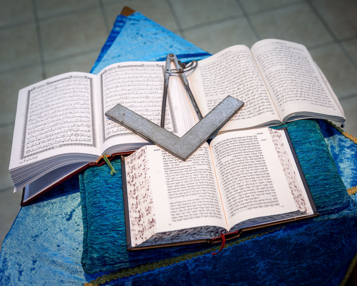Three holy books (Koran,New Testament and Old Testament) opened on the altar at the Lodge building in Haifa, Israel, 2016.