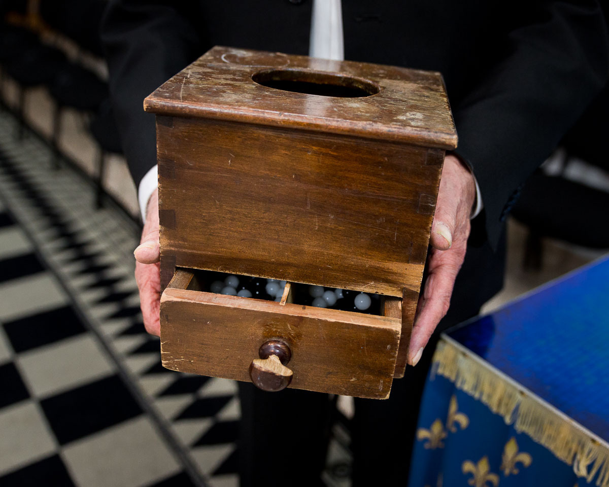 Freemason holding a ballot box at the Lodge building in Haifa, Israel, 2016.